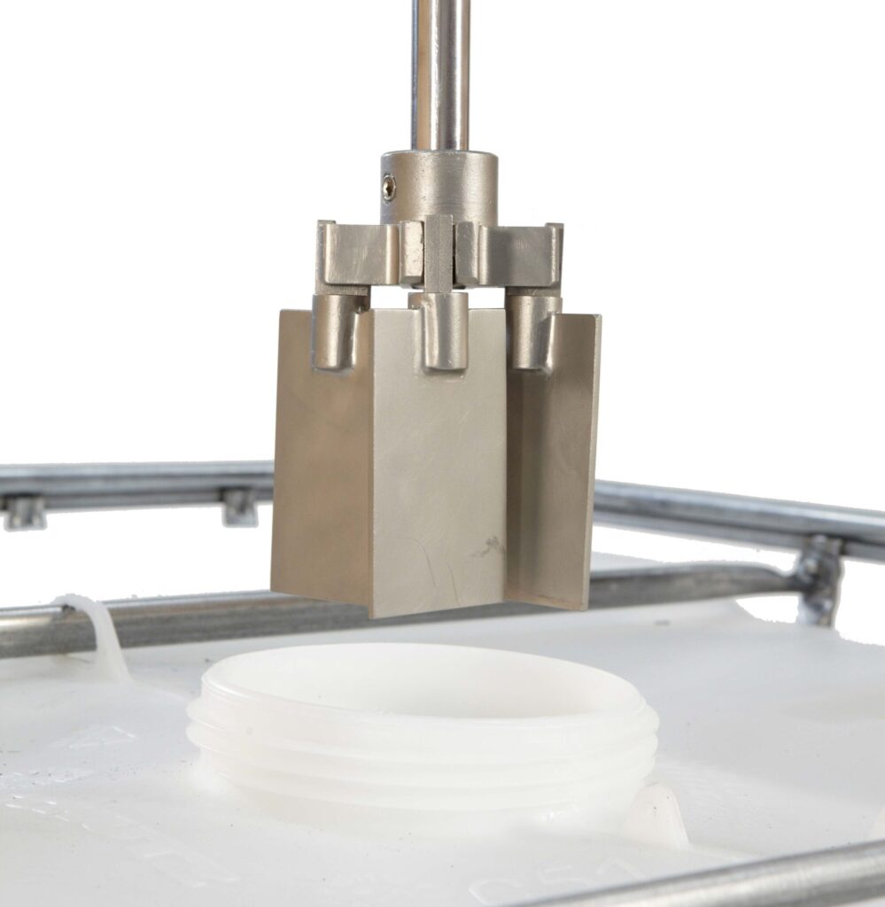 E-400 folding impeller with blades closed, above the 6 inch screw cap of an IBC tote